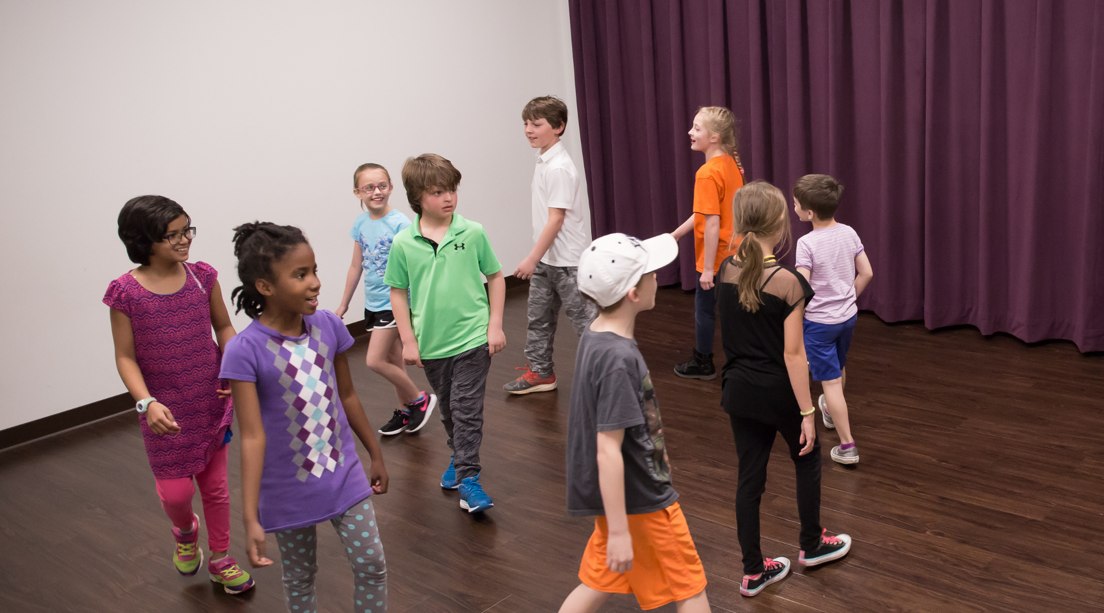 kids walking in circle playing theater game