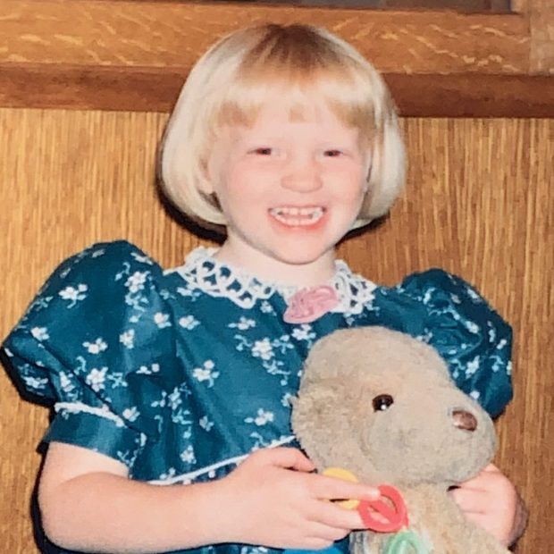 Young Girl with blonde bob and floral dress