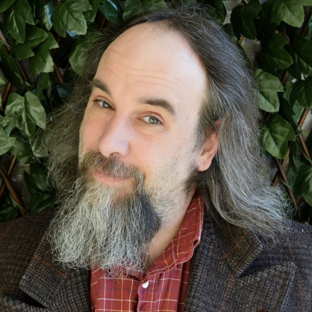 Man with beard smiling