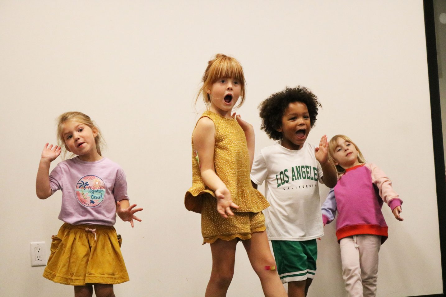 Kids singing and dancing in class